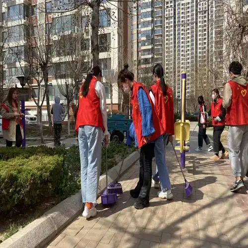 体育学院开展社区清扫志愿服务活动