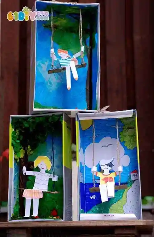 小人制作大海背景鞋盒里用搓纸制作大树和蓝天背景手工材料:鞋盒子,搓