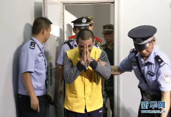 老挝警方来华提审湄公河案主犯糯康图