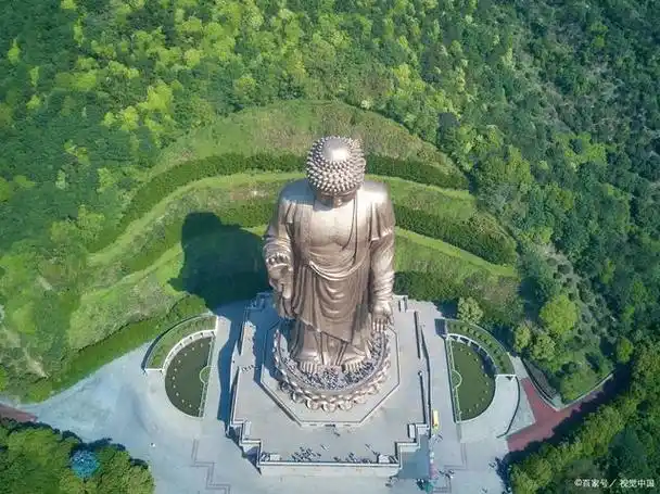 南山大佛旅游,南山大佛位于中国山东省烟台市龙口市,是一座高达38.