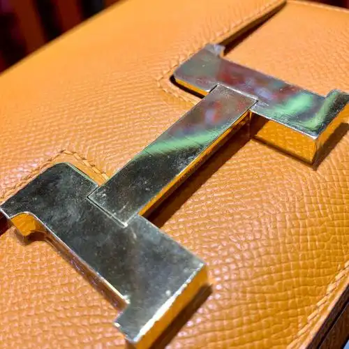 爱马仕空姐包价格hermes杏黄色掌纹牛皮康斯坦包constance19cm金扣