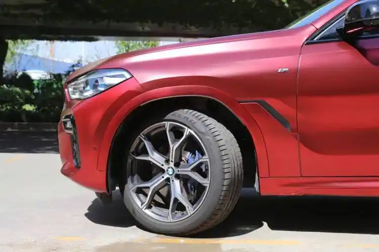 宝马x6济南欧瑟全车改色贴膜pet罗曼尼红