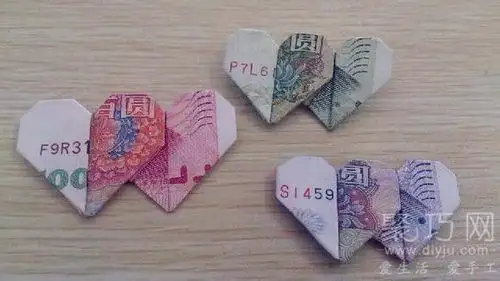 人民币折纸爱心详细图解放在钱包里的爱心创意折纸用钱折出来的立体图