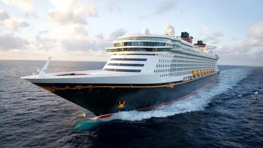 the disney magic cruise ship sails across the sea