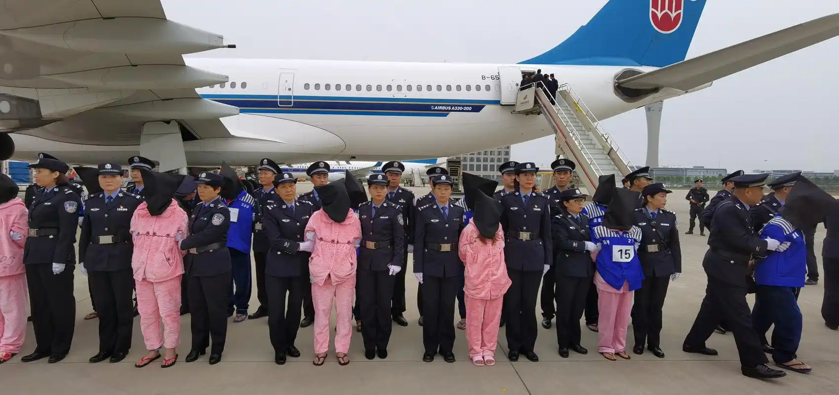 136名电信网络诈骗犯罪嫌疑人被押解回国