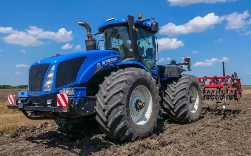 纽荷兰(new holland)t9.505铰接式拖拉机挂接深松犁作业