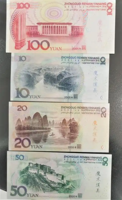 夫妻私印上亿元标注魔术道具字样人民币被公诉