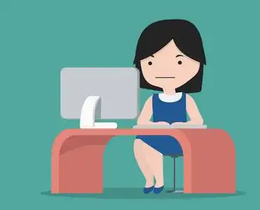 办公室工作的小女孩带着台式电脑照片