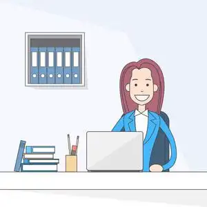 坐在办公室工作的笔记本电脑桌上的女商人照片