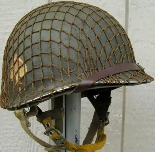 二战时美国大兵的头盔上为何都会罩着渔网是要美军充饥捕鱼么