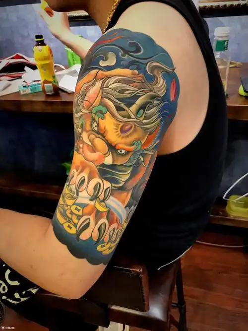 貔貅_唐狮手臂纹身图案大全 - 纹身大咖