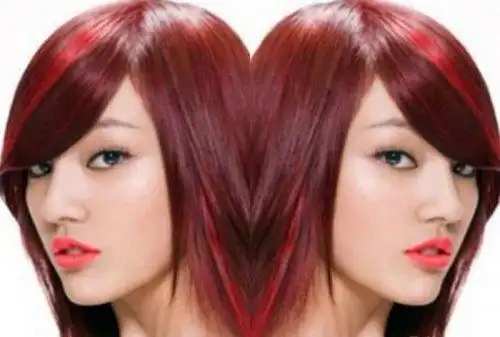 的全染的红色直发设计,冬季里倍感时尚度,经过漂染的刘海和两侧的头发
