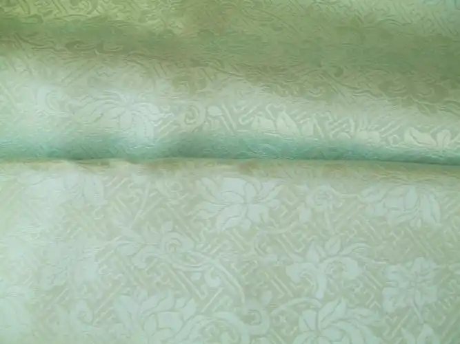 汉服布料玉色仿明代曲水缠枝莲纹丝棉缎