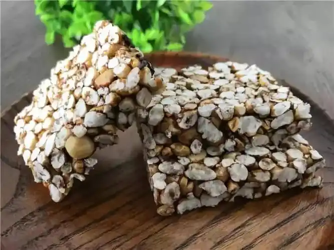 原来艾青和我一样过年,也是吃着江南冬米糖长大的江南子.