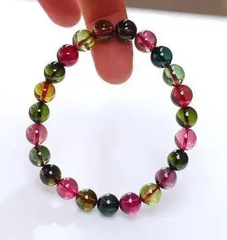 不过市面上有些被称为西瓜石的产品多数是染色的石英,水晶或玛瑙玉髓