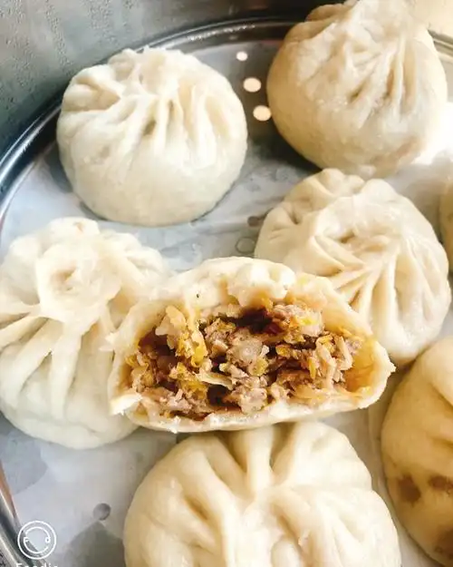 爱烘培的皮皮妈做的酸菜猪肉包子