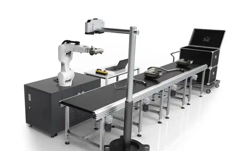 利用结构光视觉扫描系统识别待分拣或分类处理的工件,同时标定机器人