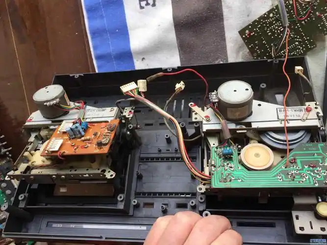 请教富华gt-800磁带机芯的拆卸