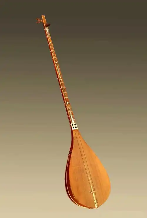 这件作品以都塔尔为创作灵感,艺术家运用其高超的技艺,将这种乐器的