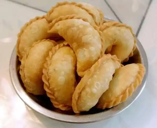 种钱叫胶罗钱在揭阳,有一种丸叫尖米丸我们还有反沙芋,广煎,揭西擂茶