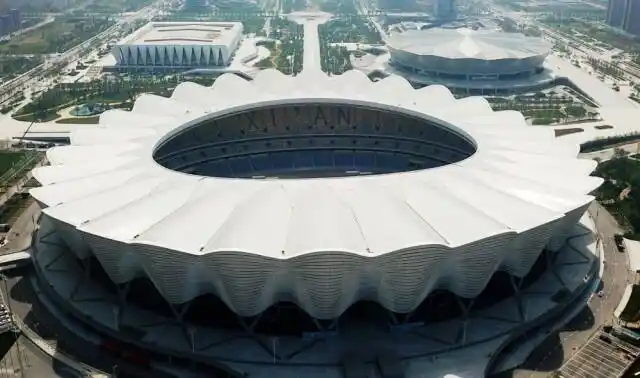 西安奥体中心是位于陕西西安国际港务区的本届全运会举行开闭幕式的主