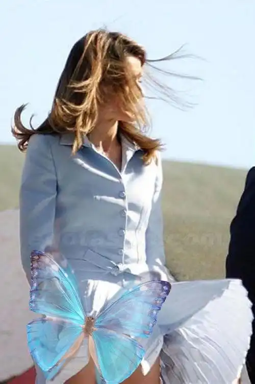 西班牙王后尴尬时刻裙子被大风吹起双手却没来得及遮住