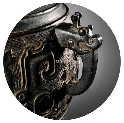 明 铜错金兽面饕餮纹龙耳尊