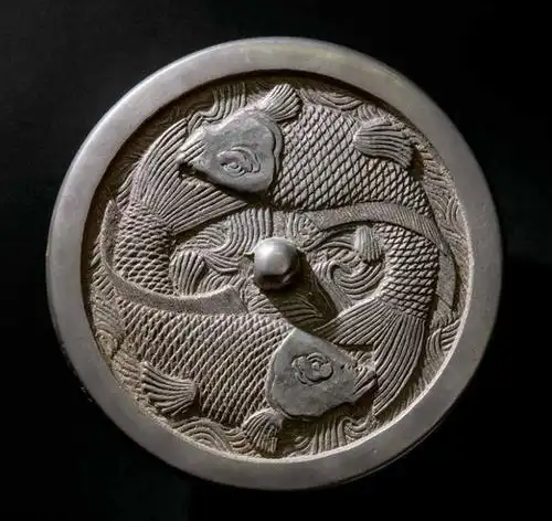 以鱼入鉴——金代双鱼铭文铜镜赏析