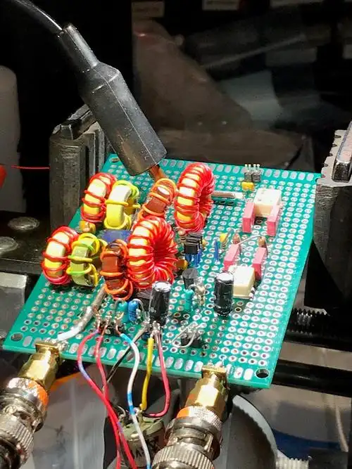 the coils, clustered around a small relay (panasonic tq2-12v)