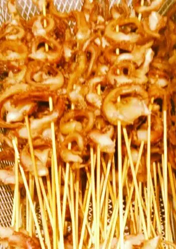 章鱼凤舞串每串原价3.5元,现价3元.