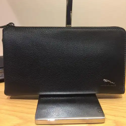 jaguar捷豹男士 时尚经典 黑色牛皮手抓包 jm1106950101_6折现价539元