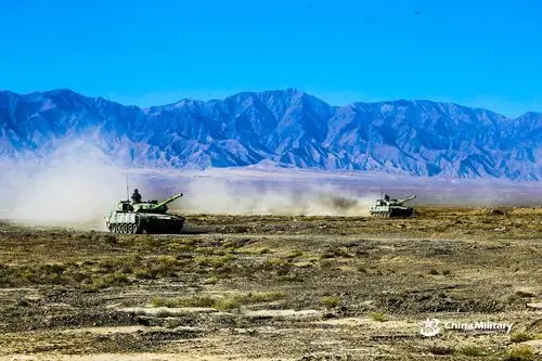 type 96a main battle tank moves on slope obstacle - china