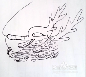 7  第三步就是给龙头画上最关键的"龙角",上边一根角靠在额头处