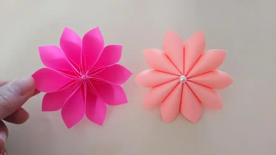 1分钟学会漂亮的八瓣花折纸,简单几步就折好了,手工折纸视频