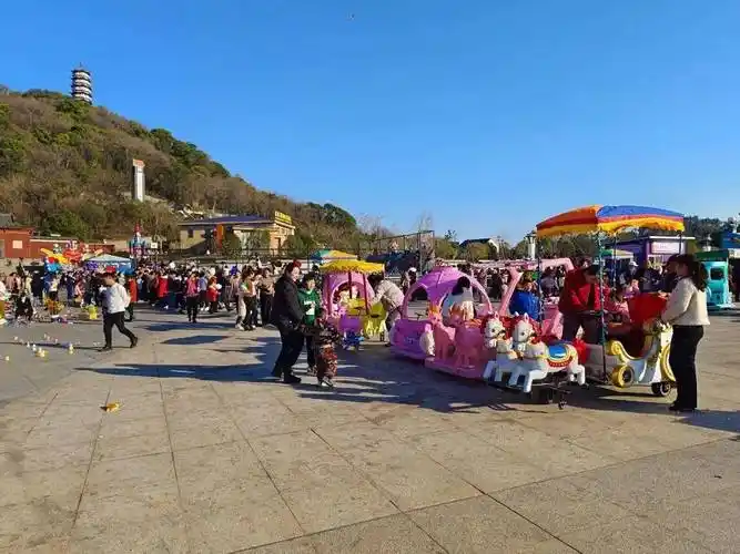 都昌南山公园游人如织 市民外出感受浓浓春意_娱乐_广场_景区