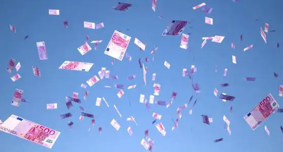 钱下来大量的钱从天上掉下来照片