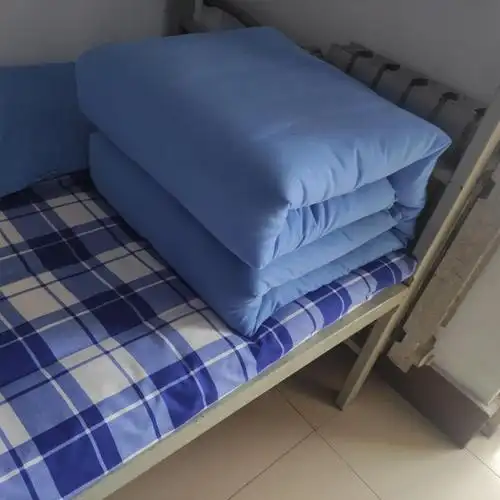 冶金与建筑工程系举行文明宿舍叠被子比赛活动