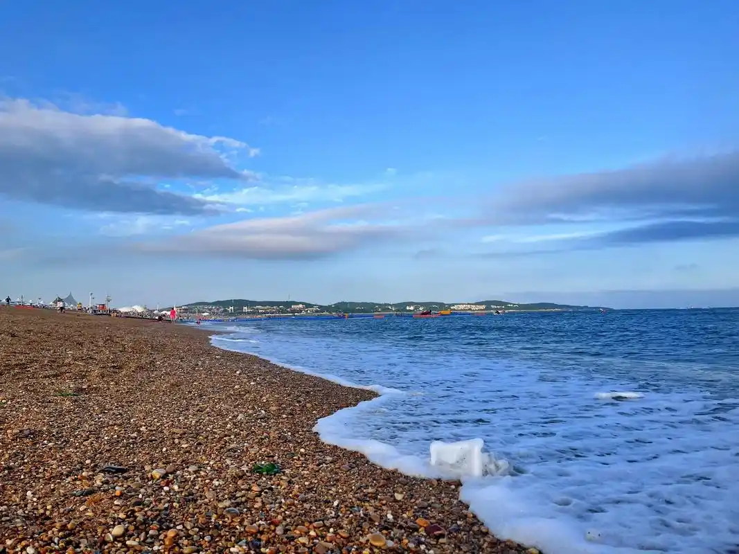 金石滩】-两天一夜游玩攻略.981.景点:金色细石海 - 抖音