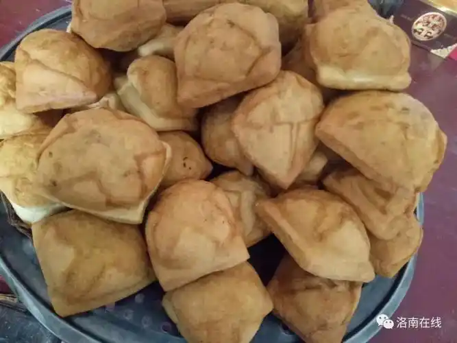 洛南的果子,可不是果树开花结的果实,而是一种油炸的面食.
