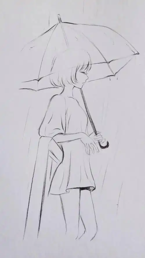 雨中独自打伞的孤独女孩