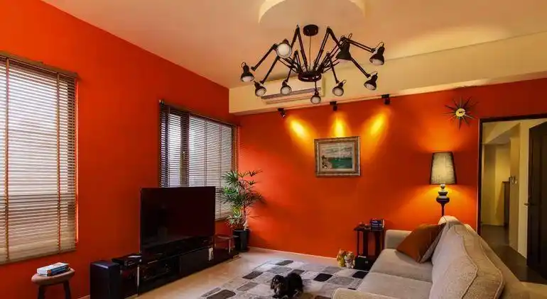 91-120平米三居室简约橙色客厅背景墙效果图
