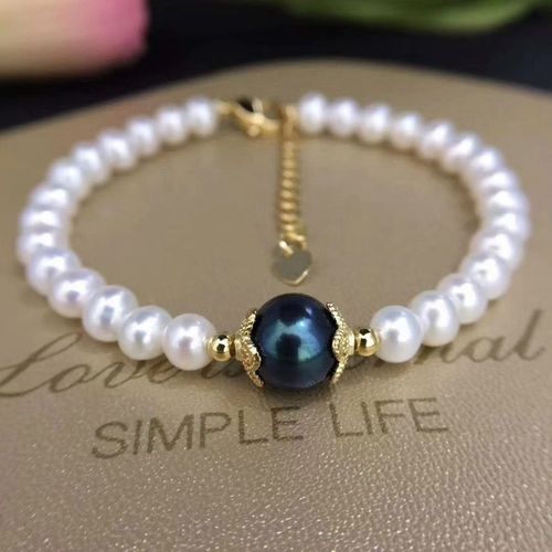 天然淡水珍珠手链近正圆强光 极少瑕品质.珠经5-5.5mm带谁好看