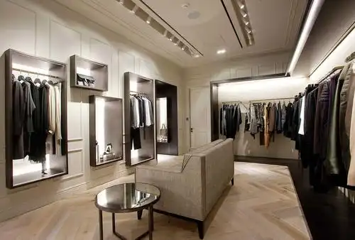 纯现代风格服装店装修货架-城起装修效果图