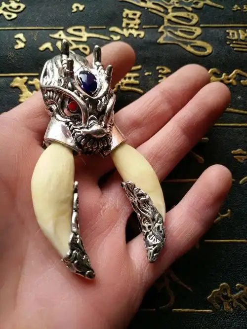 高档品质{中秋节礼物}西藏内蒙狼牙吊坠925银牙套包真黑狗牙宝宝压惊