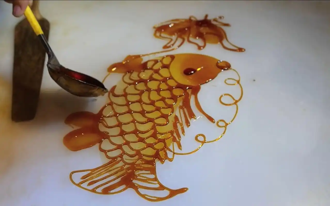 民间艺术糖画这画的鲤鱼也太漂亮了