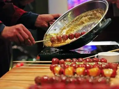 冰糖葫芦吃错伤身不值当 谁该少吃?