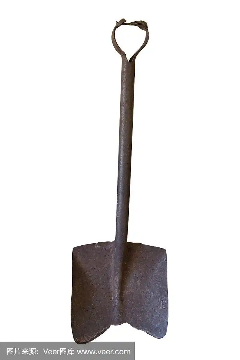 一把生锈的旧铁锹,带柄,孤立无援