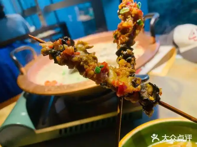 佬麻雀·至美湘味(富力盈通店)洞庭野生田螺肉串图片