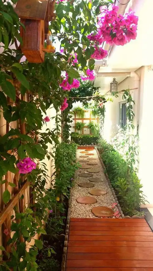 入户走廊长7米用来晒衣服浪费了改成小花园每天经过赏心悦目