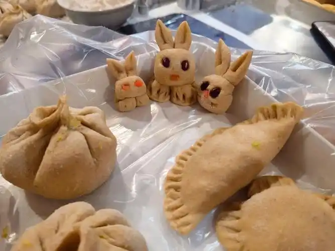 妈我这包子捏的好看不兔子形状的